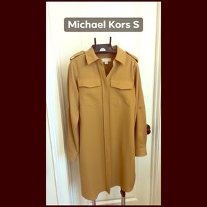 Shirt dress with gold detail.